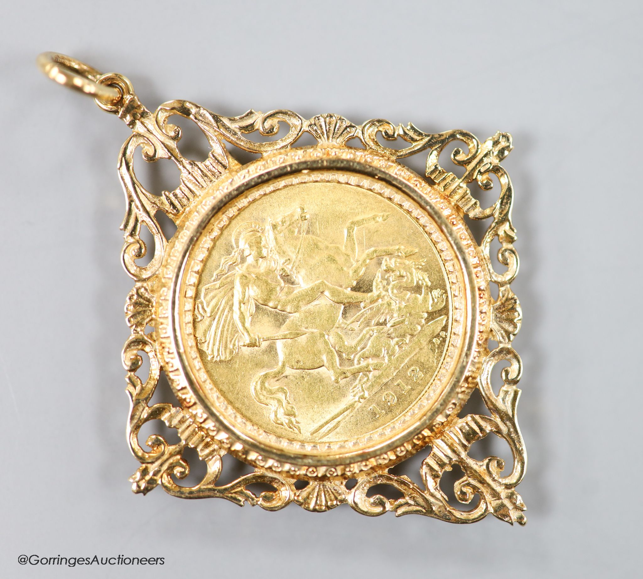 A George V 1912 gold sovereign, in a modern 9ct gold pendant mount, gross 10.4 grams.
